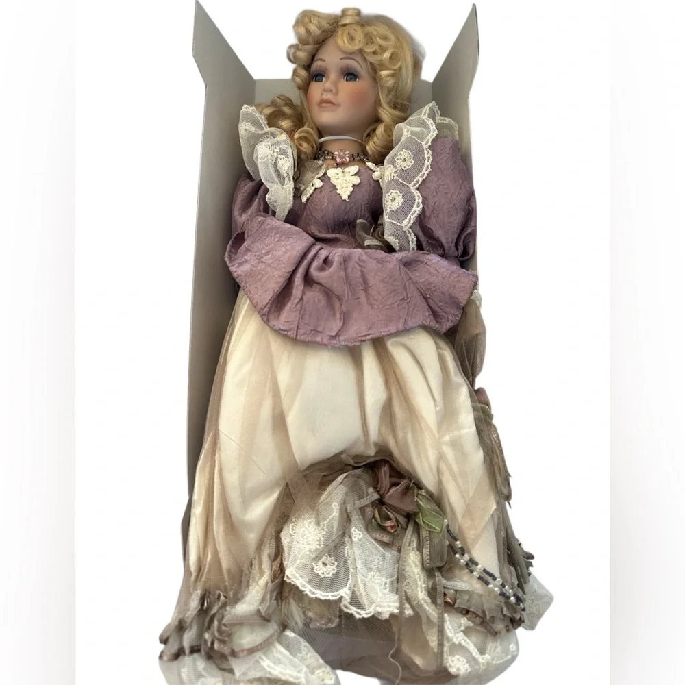 Elegant Porcelain Doll with Purple Dress Vintage